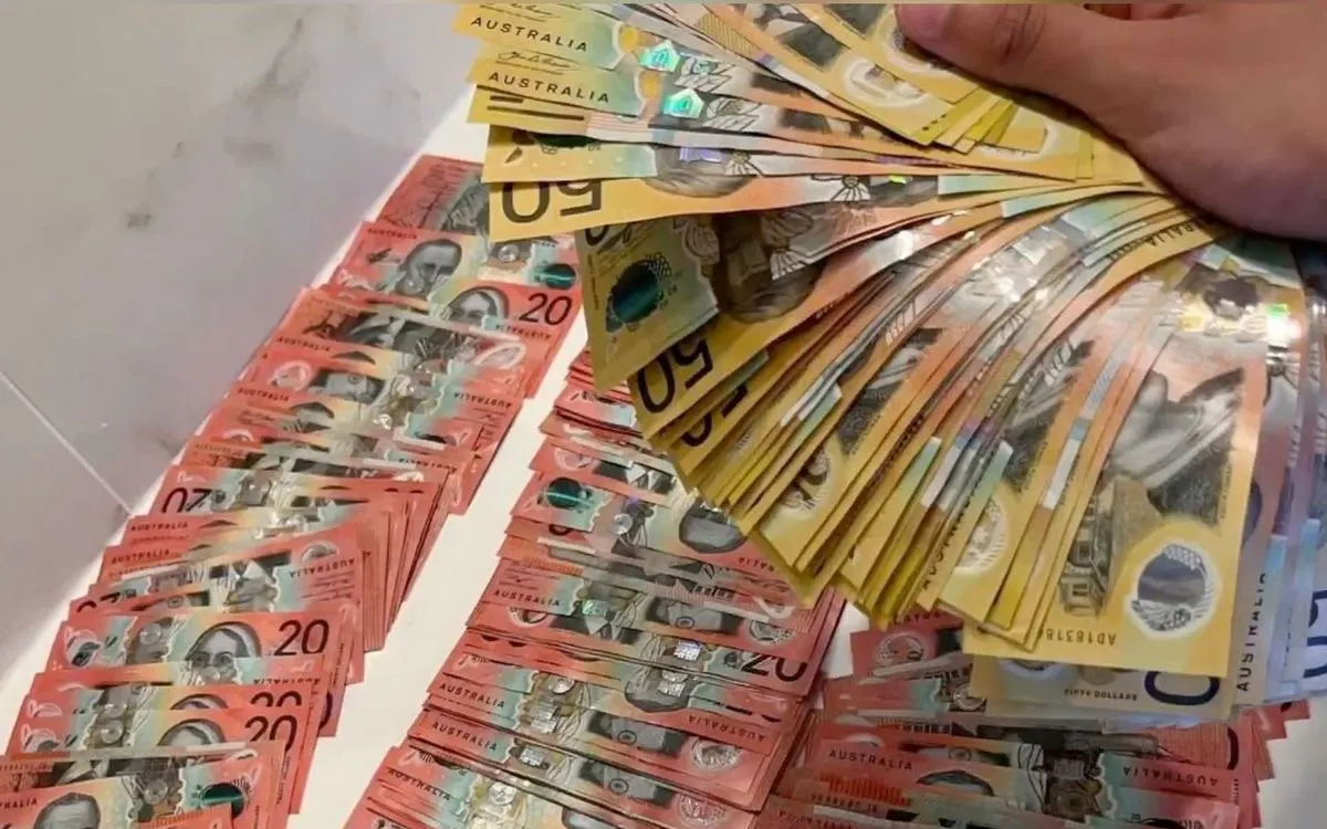 Props for filming: fanned $50 and $20 prop currency notes ready for a shoot